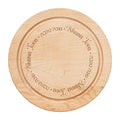 The Maple 12x12" Round Board - Shana Tova Round features "Shana Tova" in English and Hebrew around the rim—an ideal board for Rosh Hashanah celebrations.