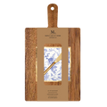 The 14" x 8" Board Gift Kit: Timeless by Sophistiplate features a wooden tray with handle, a gold spreader, and white napkins with blue floral design. The label lists the included items.
