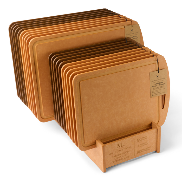 A set of Maple 18" x 12" Natural Wood Composite Chef Boards with rounded edges is neatly arranged in two holders. Each durable, heat-resistant cutting board features a product tag and a brown wood fiber finish.