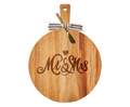The Maple 19" x 14" Acacia Thick Handle Cutting Board with Mr & Mrs script, striped bow, and gold spreader makes a stylish engraved kitchen decor or personalized charcuterie board for special occasions.
