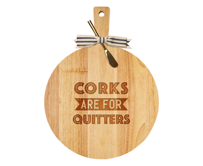 The Maple 19" x 14" Rubber Wood Thick Handle Board features a gold spreader and is engraved with “Corks are for Quitters”—a fun, personalized piece for any gathering.