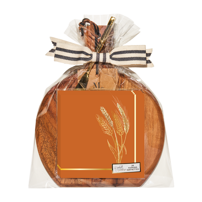 Introducing the Sophistiplate 9.75″ x 8″ Board Gift Kit w/ Gold Spreader: Harvest Wheat – a beautifully packaged set in clear plastic and finished with a ribbon. This elegant gift includes an acacia wood charcuterie board, a gold spreader, and orange napkins featuring an eye-catching wheat design on the front. Perfect as a cheese board set or appetizer serving board for any occasion.