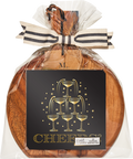 A 9.75″ x 8″ Midnight Sparkle Board Gift Kit by Sophistiplate, beautifully wrapped in clear plastic and tied with a striped ribbon, features a festive card adorned with stacked champagne glasses and the word “Cheers!” in gold. A small wooden tag engraved with the letter “M” is attached to the set, which also includes elegant cocktail napkins for a complete celebratory presentation.