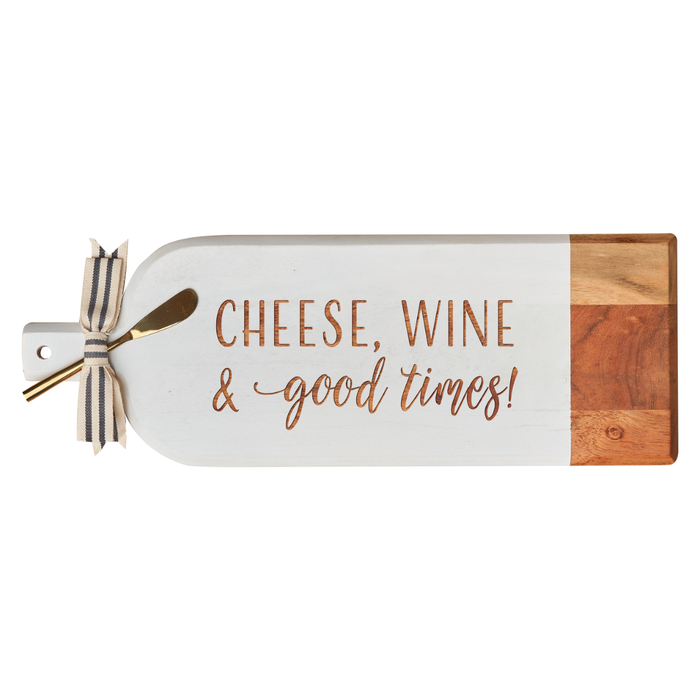 The Maple Acacia Bevel Board Long White (20x7") features "Cheese, Wine & Good Times" script, a striped ribbon on the handle, and includes a gold spreader—perfect for charcuterie.