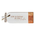 The Maple Acacia Bevel Board Long White (20" x 7") features "Life is better at a Lake," includes a gold spreader and ribbon—an elegant choice for your next charcuterie or serving display.