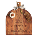 The Maple Acacia Bevel Board (15x12") features "Meet Me at the 19th Hole" with crossed golf clubs, a gold spreader knife tied with ribbon, a round cheese topped with pecan, and two slices of fruit and nut bread.