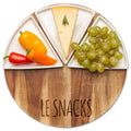 The Maple Acacia Fête Set Round | Le Snacks | 12" Round holds three ceramic snack dishes with yellow and red mini peppers, a cheese wedge garnished with rosemary, and a bunch of green grapes.