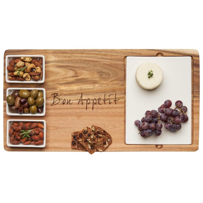 The Maple Acacia Fête Set Tray | Bon Appetite (18" x 9.5") features “Bon Appetit” engraving and comes with ceramic snack dishes, perfect for serving cheese, red grapes, assorted crackers, olives, nuts, and seasoned almonds.
