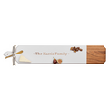 The Maple Acacia Heirloom Board Skinny in white (34 x 6") comes with a gold spreader, ribbon, and can be personalized. Perfect for serving cheese, figs, and pecans.