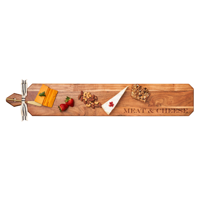 The Maple Acacia Heirloom Board Skinny (34x6") with gold spreader and "Meat & Cheese" label is perfect for charcuterie—serve cheddar, brie, fruits, nuts, bread, and more in style.