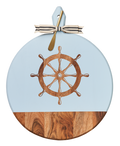 The Maple Acacia Heirloom Board with Handle (20 x 16"), featuring a ship’s wheel design, woodgrain base, gray & white ribbon, and gold spreader, is perfect for serving charcuterie.