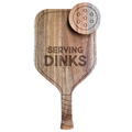 The Maple Acacia Pickleball Board | Serving Dinks | 16 x 9 features "SERVING DINKS" engraving, a natural wood finish, ergonomic handle, and includes a wooden pickleball—ideal for display or as a charcuterie table centerpiece.