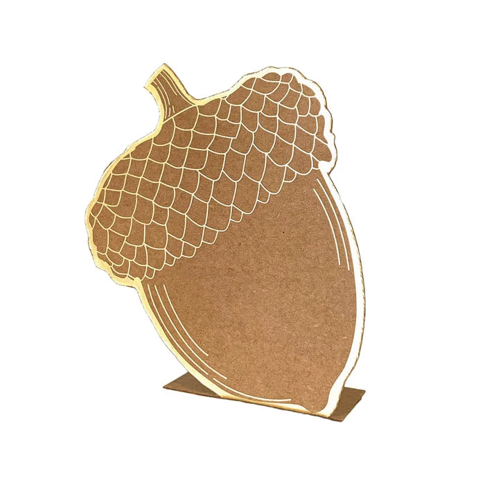 Hester & Cook’s Acorn Place Card - Pack of 12 features upright cardboard acorn cutouts with brown bodies, lighter outlined caps, and simple details—ideal for autumn celebrations and perfect for place settings.