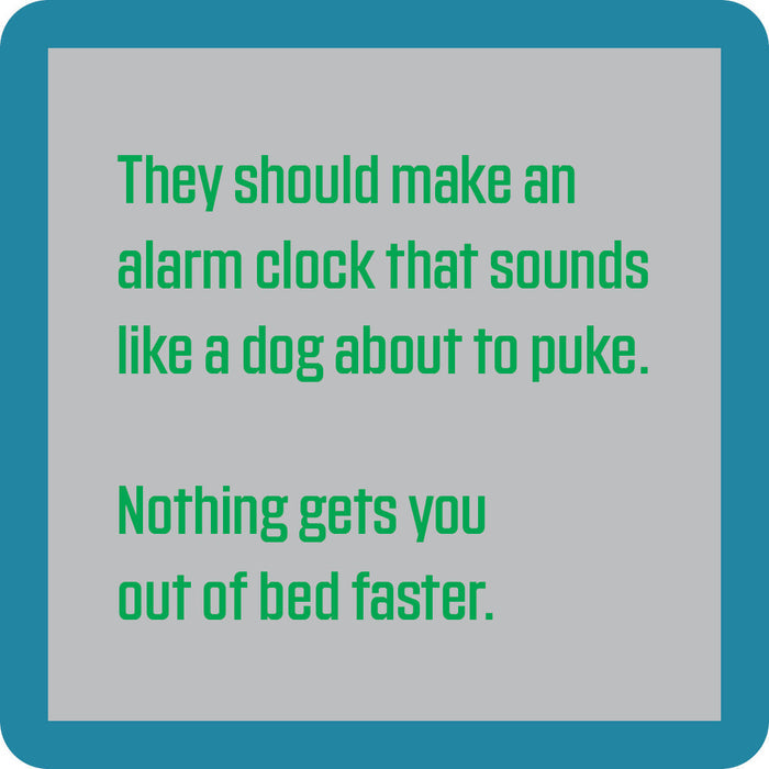 The Alarm Clock Coaster by Drinks On Me features a gray square with teal border and green text: “They should make an alarm clock that sounds like a dog about to puke. Nothing gets you out of bed faster.” A perfect funny gift or quirky coaster!.