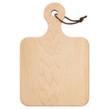 The Maple Artisan Maple Paddle Board (9" x 6") features light maple wood, smooth edges, a rounded handle with a hanging hole and brown leather loop, and showcases natural wood grain—perfect as a charcuterie board. No engraving included.