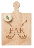 A round cheese with dill rests on the Maple Artisan Maple Paddle Board | Par (9" x 6"), which features two crossed golf clubs and the word "PAR" engraved on it.