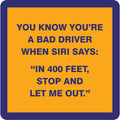 Drinks On Me’s Bad Driver Coaster features a yellow sign with blue border reading: "You know you’re a bad driver when Siri says: In 400 feet, stop and let me out." Perfect for bar carts or as a unique housewarming gift.