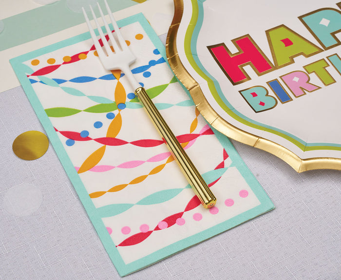 The Bright Birthday Table Setting by Sophistiplate features designer plates with gold scalloped edges, a gold-handled fork, and a streamer napkin—perfect for a colorful birthday party tableware display.