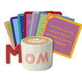 The Cheers to Mom Gift Set 2 by Sophistiplate LLC features a coffee cup with MOM on it, latte art, and vibrant cards—including one that says, "My kid is turning out just like me. Well played, karma. Well-played." Ideal for Mother’s Day gifts!.