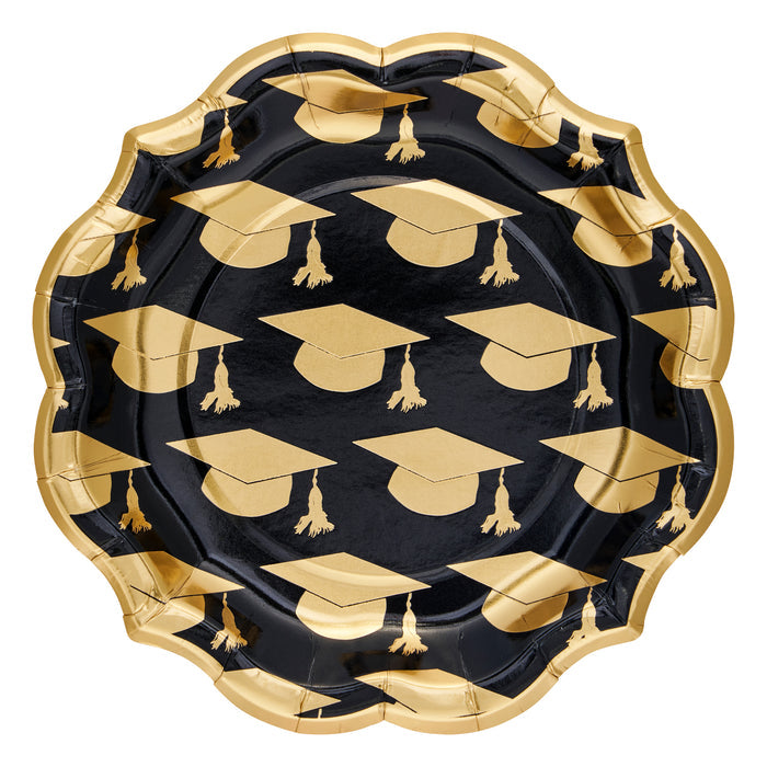 The Sophistiplate Classic Grad Salad Plates (8pk) feature a round, scalloped-edge design with a black background, gold graduation caps and tassels, and a gold rim—ideal chic tableware for your celebration.