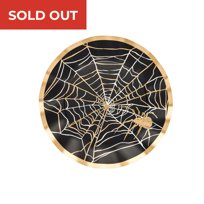 The Sophistiplate Classic Spooky Wavy Paper Dinner Plate/8pk features a round design with a gold rim, a striking white spider web motif, and a gold spider on a black background—perfect for crafting an elegant and spooky Halloween tablescape. A red SOLD OUT banner appears in the top left corner.