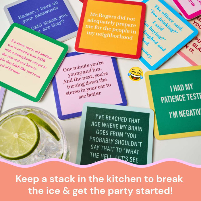 A stack of Drinks On Me’s Coaster Bundle: Best Sellers 2, featuring colorful, funny quotes, sits on the table by a lime water. Keep this best-selling set in your kitchen to break the ice and get the party started—perfect gift for friends!.