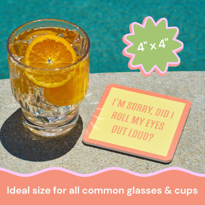 A glass of iced water with orange slices sits by the pool next to a Drinks On Me coaster from the Coaster Bundle: Best Sellers. The 4x4 size fits most glasses and cups, making it a fun party gift or perfect addition to any coaster set.