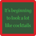 The Drinks On Me Cocktail Coaster is a green sign with a red border and “It’s beginning to look a lot like cocktails” in playful green text—ideal as a funny drink coaster or quirky bar cart accessory.