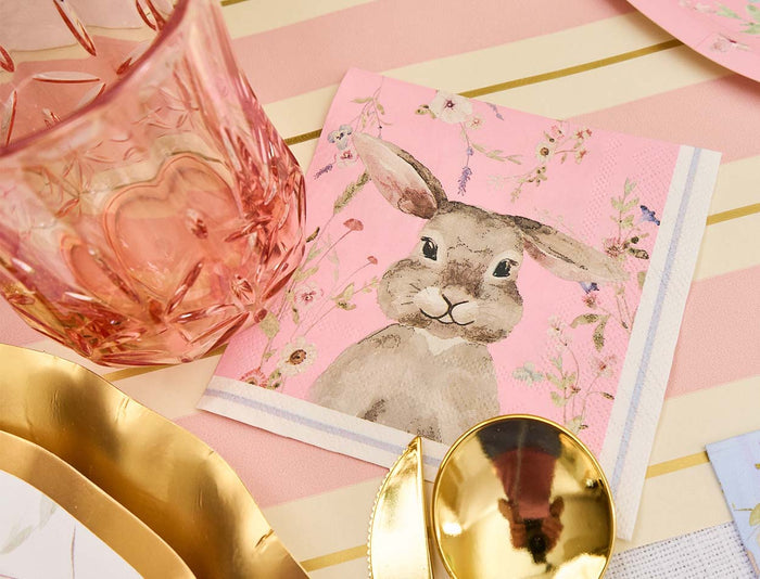 The Sophistiplate Cocktail Napkin Charming Easter (26/pkg) features a pink design with a watercolor rabbit and flowers—perfect for your spring brunch table setting or cocktail napkins collection.