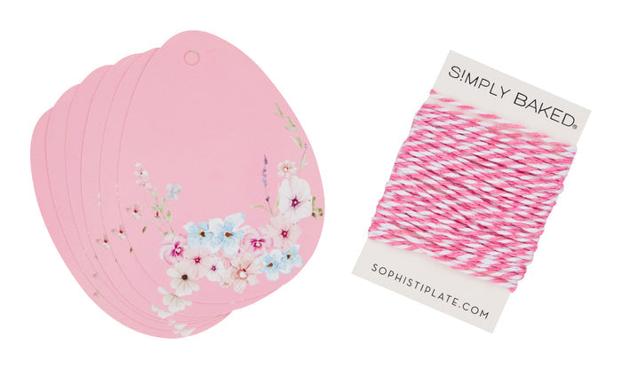 Sugarplum's Cookie Tray Gifting Kit Charming Easter/6pkg includes five pink, floral egg-shaped tags and baker’s twine—perfect for adding cheer to your Easter treats or any gift!.