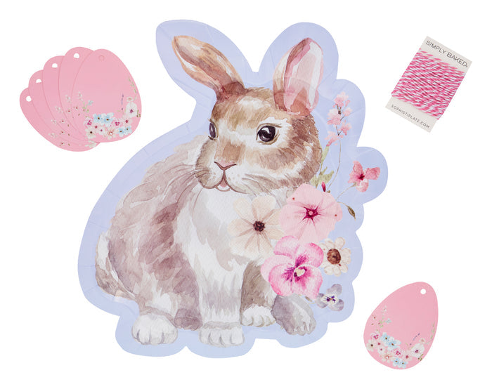 The Sugarplum Cookie Tray Gifting Kit Charming Easter/6pkg features pastel art of a brown and white rabbit with pink flowers, pink floral egg tags, and pink & white twine—ideal for gifting Easter treats.