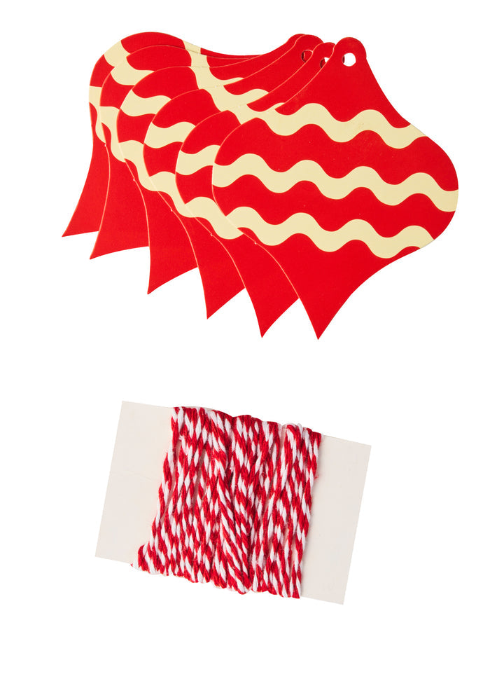 The Sugarplum Cookie Tray Gifting Kit Nutcracker/6pkg features festive red gift tags with gold wavy lines and a hole for string, shown above coordinating red and white twine wrapped around a white card—ideal for holiday treat exchanges.