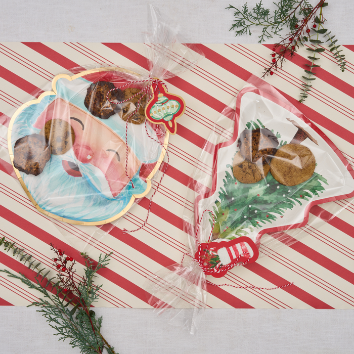 Sugarplum's Cookie Tray Gifting Kit Santa/6pkg includes festive Santa and Christmas tree plates, perfect for holiday cookies or treat exchanges—display cookies on the red-and-white tray with evergreen sprigs for festive gifting.