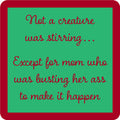 The Creature Stirring Coaster by Drinks On Me features a green square with a red border and red cursive text: "Not a creature was stirring... Except for mom who was busting her ass to make it happen." A funny drink coaster or unique housewarming gift.