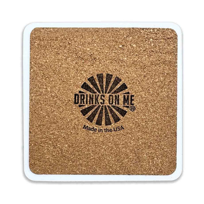 The Creature Stirring Coaster by Drinks On Me is a square cork coaster with a white border and playful sunburst design—perfect as a funny bar cart accessory or housewarming gift, and proudly made in the USA.