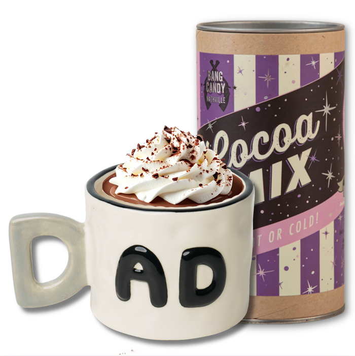 The Sophistiplate LLC Dad Mug + Hot Cocoa Gift Set includes a stylish mug and a Bang Candy Hot Cocoa Mix in a purple-and-cream retro container—ideal for sharing cozy, heartwarming moments.