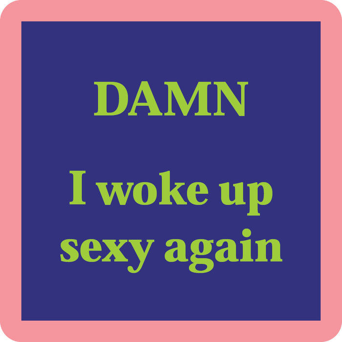 The Damn Coaster by Drinks On Me features a square design with a pink border, blue background, and bold light green text: DAMN I woke up sexy again—perfect for adding humor to your drinkware or bar cart.