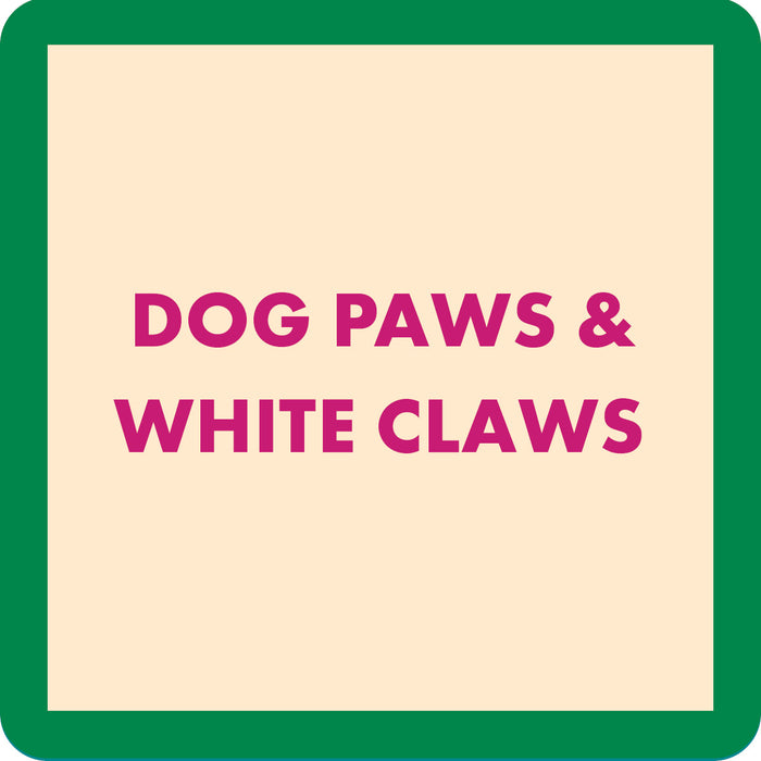 The Dog Paws Coaster by Drinks On Me features bold pink text on a beige background with a green border—perfect for adding humor to your drinkware or charm to your bar cart accessories.