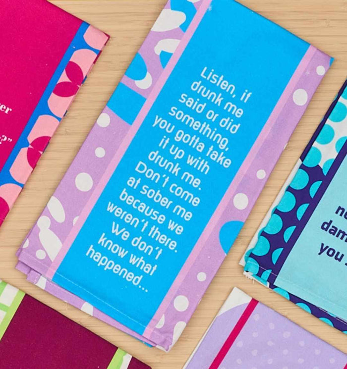 The Drunk Me Dish Towel by Drinks On Me features colorful polka dot and stripe patterns with the hilarious quote: "If drunk me did something, take it up with drunk me. Sober me wasn’t there." Perfect as a funny housewarming or kitchen gift!.