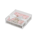 The Sophistiplate Easter Cocktail Napkin with Napkin Tray includes pink floral rabbit napkins tied with a white satin ribbon in a clear acrylic tray—an elegant, modern addition to your tabletop.