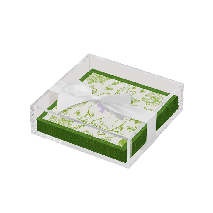 A modern tabletop essential, the Sophistiplate Easter Cocktail Napkin with Napkin Tray showcases green-bordered napkins featuring floral and bunny designs on white, all tied with a white ribbon.