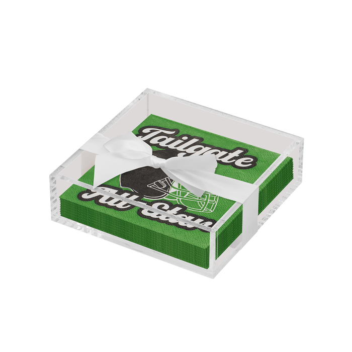 The Sophistiplate Everyday Cocktail Napkin with Napkin Tray features green napkins printed with a football helmet and "Tailgate All Season," arranged in a clear acrylic tray and tied with a white ribbon.