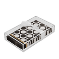 The Sophistiplate Everyday Guest Towel with Napkin Tray features black and white polka dot guest towels neatly arranged in a clear rectangular tray and tied with a white ribbon.