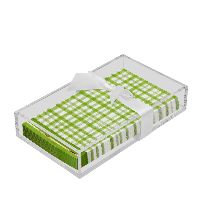 The Sophistiplate Everyday Guest Towel with Napkin Tray features green and white plaid napkins, neatly tied with a white ribbon, elegantly displayed in a clear acrylic tray against a white background.