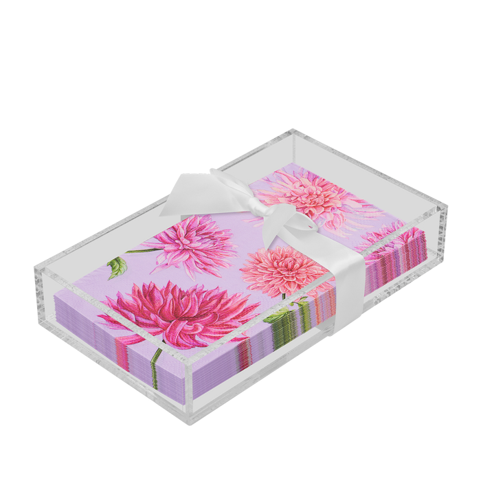 A Sophistiplate Floral Guest Towel set, featuring dahlia design napkins, is elegantly arranged in a ceramic and acrylic napkin tray.