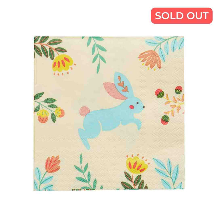 The Sophistiplate Folklore Easter Cocktail Napkins (20pk) feature a blue bunny with pink ears and tail, surrounded by colorful flowers and green leaves—perfect for Easter parties. A red SOLD OUT label is shown in the top right corner.