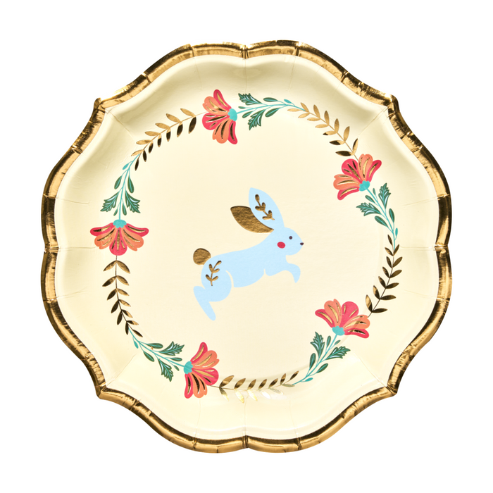 The Sophistiplate Folklore Easter Salad Plates (8pk) are cream-colored with a gold scalloped edge, featuring a light blue bunny surrounded by floral wreaths—perfect for your Easter celebration.