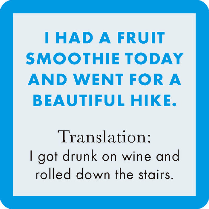 The Fruit Smoothie Coaster by Drinks On Me features a text graphic with an aqua border: “I had a fruit smoothie today and went for a beautiful hike.” Below, in small print: “Translation: I got drunk on wine and rolled down the stairs.” Perfect quirky bar cart accessory!.