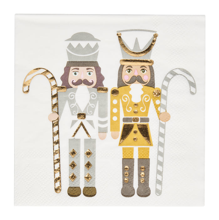 Add festive charm to your table with Sophistiplate's Gilded Nutcracker Paper Cocktail Napkins (20pk), featuring two illustrated nutcrackers in gold and silver outfits, each with a striped candy cane.