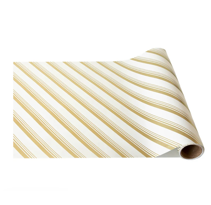 The Hester & Cook Gold Peppermint Stripe Runner (20x25") features diagonal gold and white stripes, making it ideal for gift wrapping or as a stylish paper table runner, shown partially unrolled on a white background.